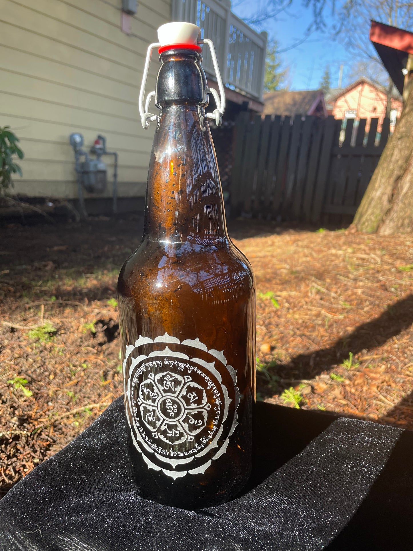 Om Mani Padme Hum / Ganesh 1000ml Amber Glass Water Bottle