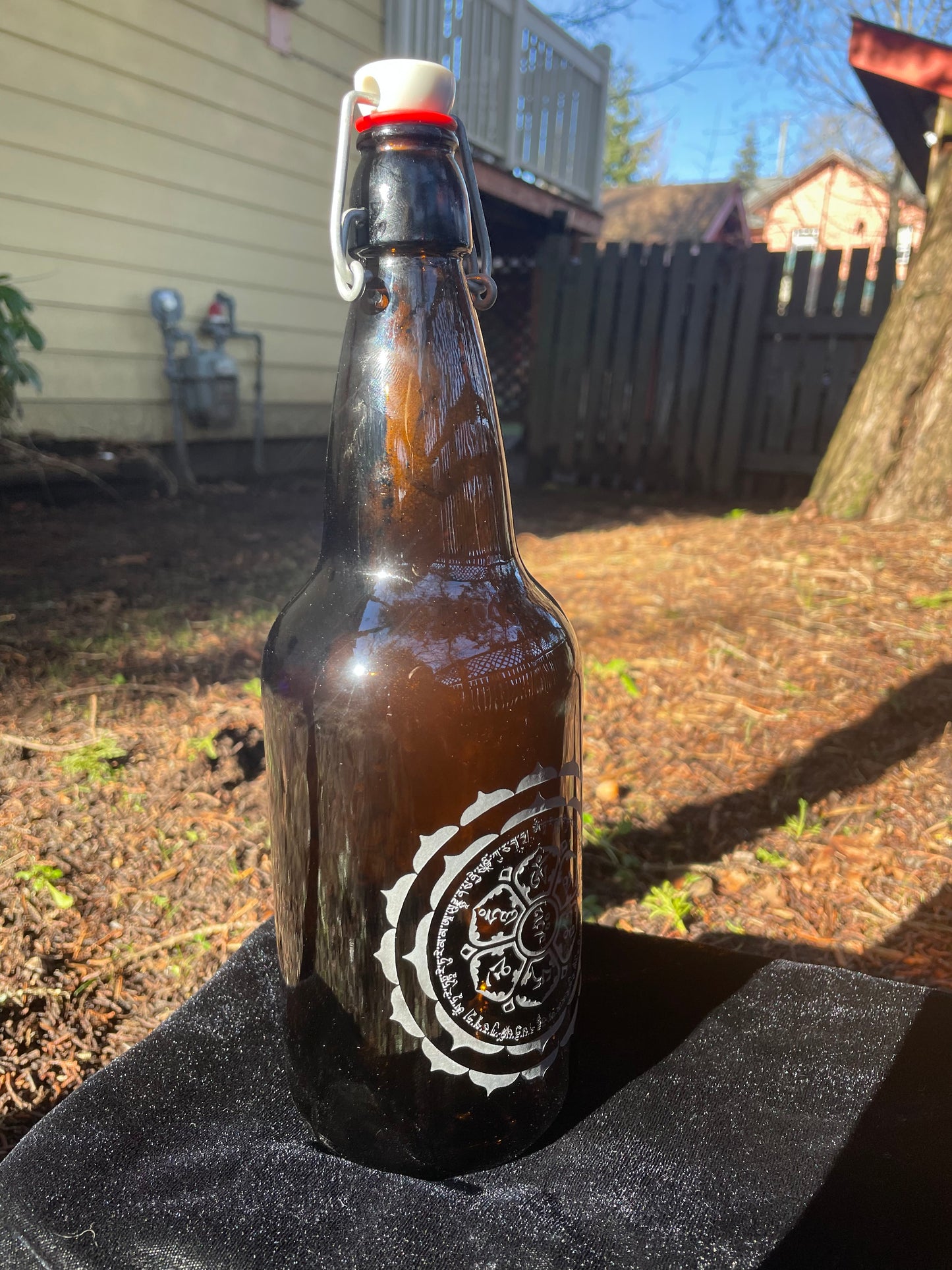 Om Mani Padme Hum / Ganesh 1000ml Amber Glass Water Bottle